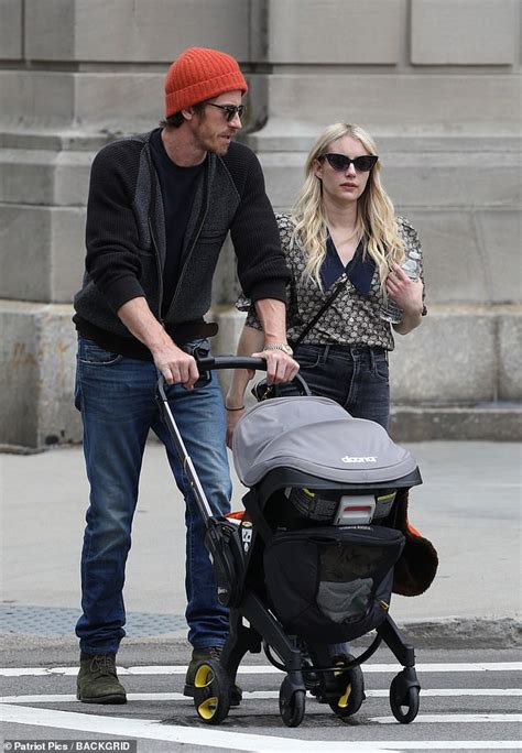 Emma Roberts And Garrett Hedlund Kiss While Out In Boston With Their Five Month Old Son Rhodes