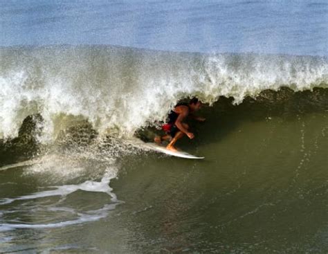 hurricane surfing picture hurricane irene surfers take advantage of huge waves abc news