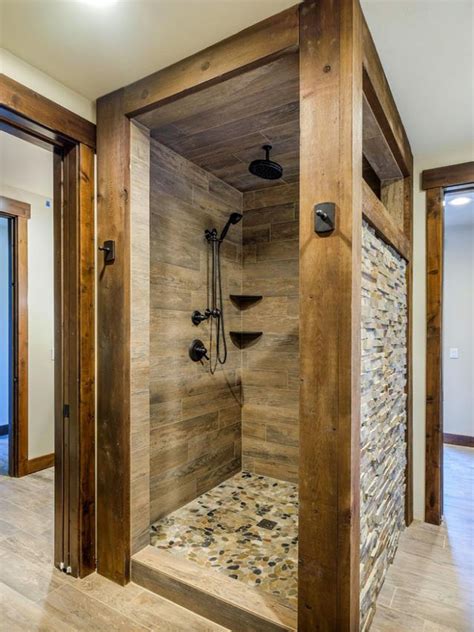 Sometimes you can only choose of the two important point either safety or beauty. River Rock Floor in 2020 | Rustic bathroom remodel, Stone ...