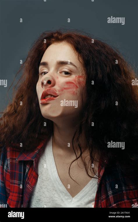 Womans Face Crushed On Glass Smeared Lipstick Stock Photo Alamy
