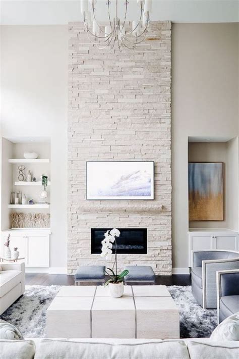 Chunky chenille fabric satisfies your need for a piece that feels as good as it looks. Stone Fireplace With Pastel Blue Touches in 2020 | Living ...