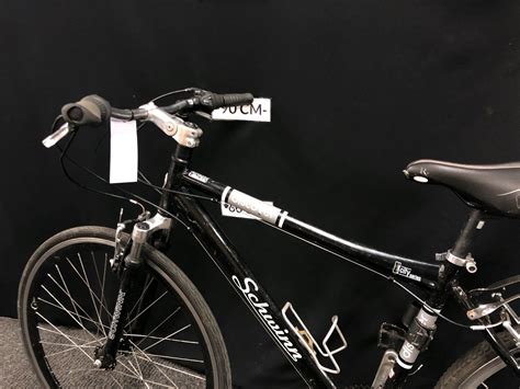 Black Schwinn Discover 21 Speed Front Suspension Hybrid Trail Bike