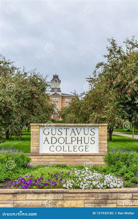 Entrance Sign And Old Main Clock At Gustavus Adolphus College Editorial