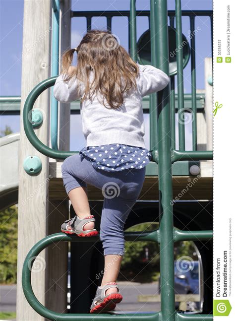 Girl Climbing Up A Ladder Stock Image Image Of Ladder 30756237