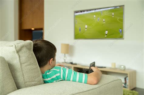 Boy Watching Television In Living Room Stock Image F0144574