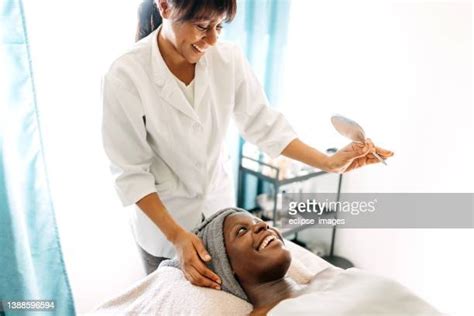 black woman oil skin photos and premium high res pictures getty images