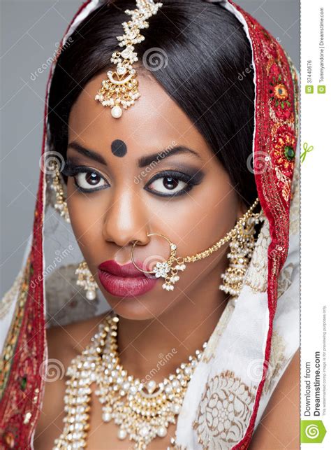Young Indian Woman In Traditional Clothing With Bridal