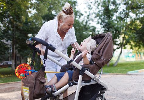 Granny Playing With Her Grandson High Quality People Images