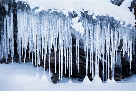 Row Of Frosty Icicles In Nature Photograph By Juhani Viitanen Pixels