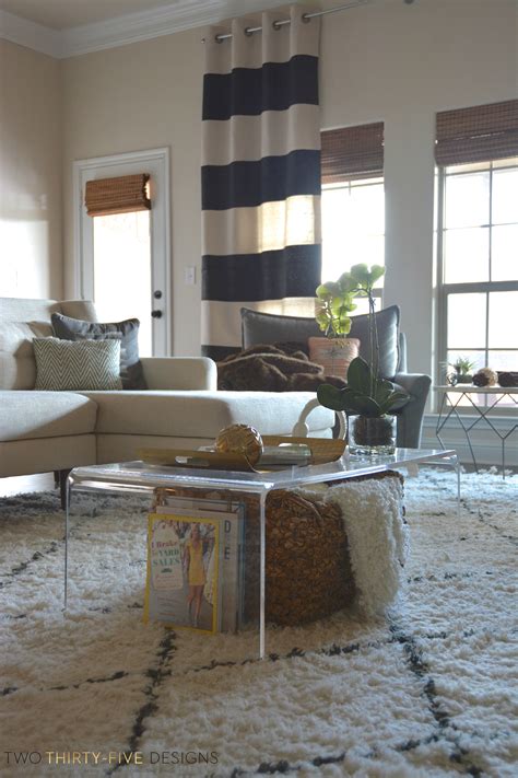 11 illusion end table from anthropologie, $998. Lucite Coffee Table Styling - Two Thirty-Five Designs