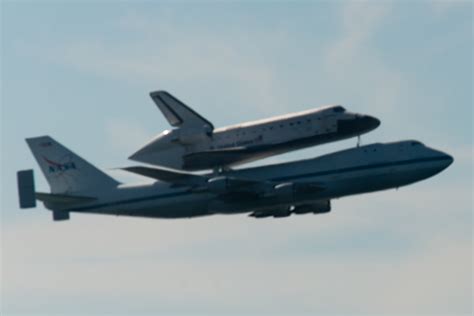 Free Photo Space Shuttle Endeavour And Carrier Plane Flying Over San