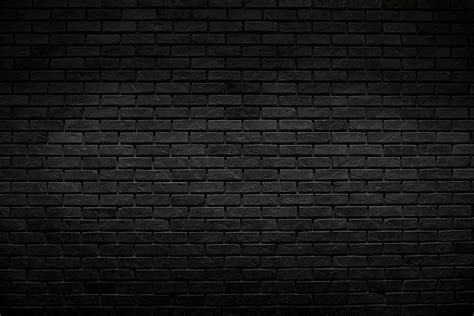 The Old Vintage Black Brick Wall Background With Lighting Decoration