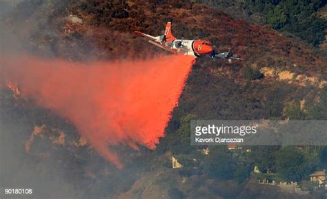 A California Department Of Forestry Firefighting Plane Drops Fire