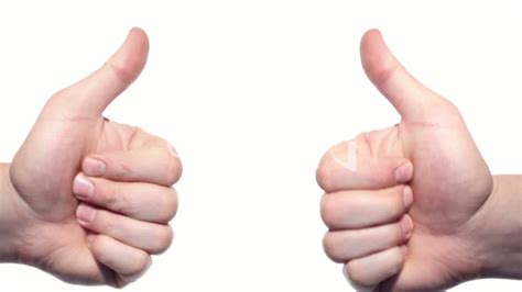 Two thumbs up isolated on a white background.: Royalty-free video and stock footage