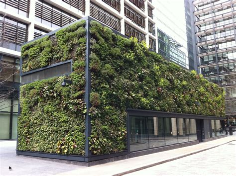 Building In New Square London Covered With Plants Using Green Wall