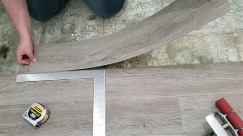 How To Install Peel And Stick Vinyl Plank Flooring The Nifty Nester