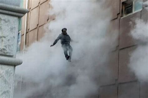 Man Takes Amazing Leap Of Faith To Jump Out Of Burning Building