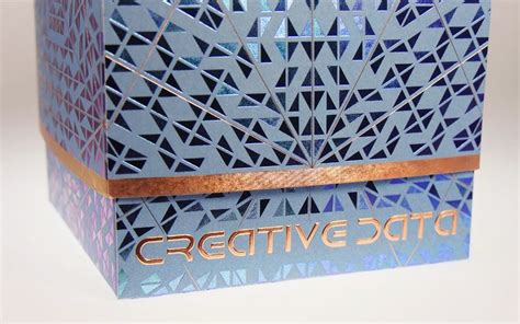 Copper Foils Embossing And Brilliant Blue Create Stunning Packaging