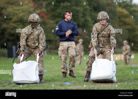 Soldiers Demonstrate The Casualty Drag Stage In The British Armys New