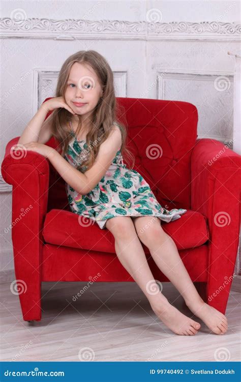 Happy Barefoot Little Girl In Dress Sits Stock Photo Image Of