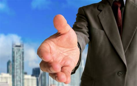 Premium Photo Businessman Showing Gesture Handshake