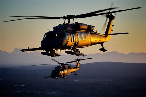 Two Us Air Force Hh 60 Pave Hawk Recovery Helicopters Fly Over Alaska