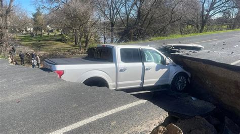 Giant Sinkhole Swallows Truck As Drivers Keep Ignoring Road Closed