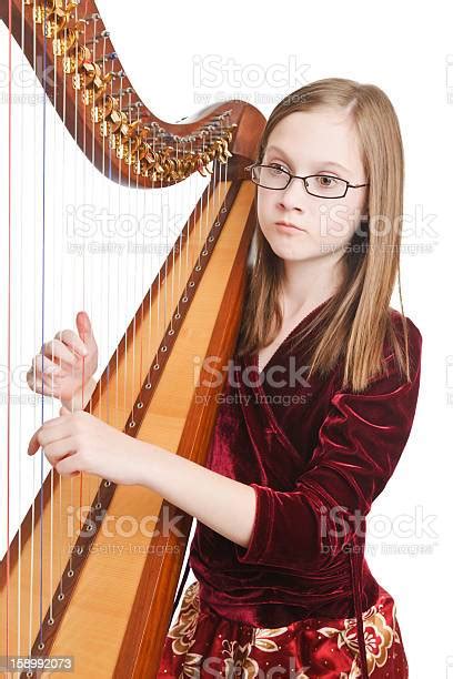 Girl Playing Harp Stock Photo Download Image Now 12 13 Years Brown