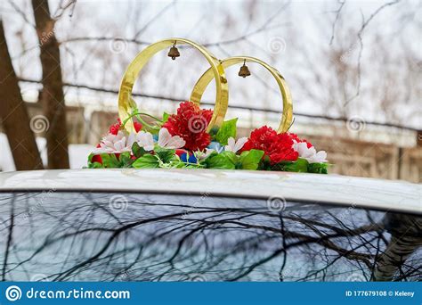 Wedding Rings As Decoration On The Car Before Marriage Ceremony In