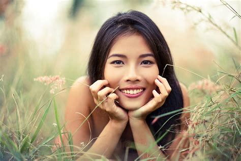 Cute Asian Woman Portrait Enjoying In The Nature By Stocksy