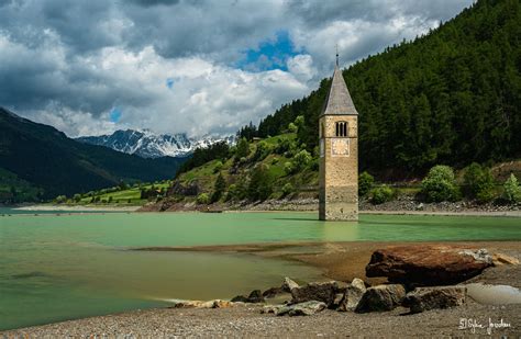 Submerged Church Tower Of Graun Lake Reschenresia Italy