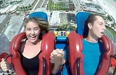 ride his friend slingshot he harness her rollercoaster fairground forth flails knocked arm seat back after