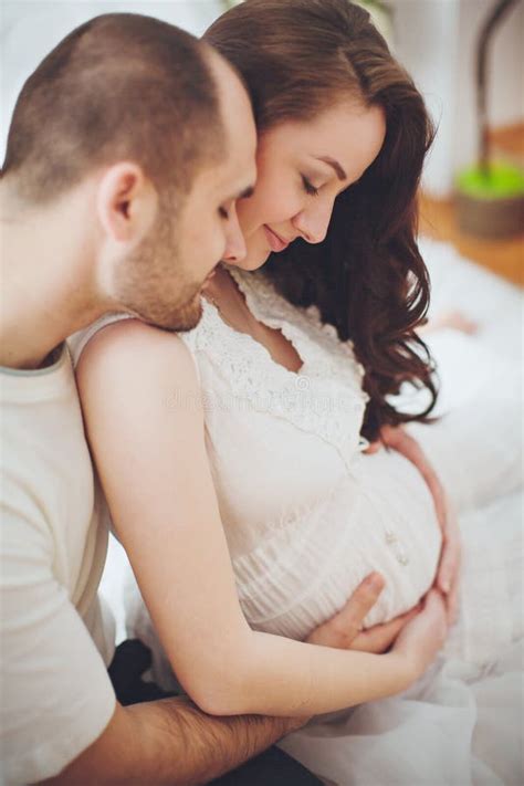 Beautiful Pregnant Woman And Her Husband Stock Image Image Of Motherhood Brunette 52810751