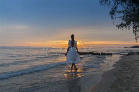 Woman Walking At Shore Alone Stock Photo Image Of Sunlight Female