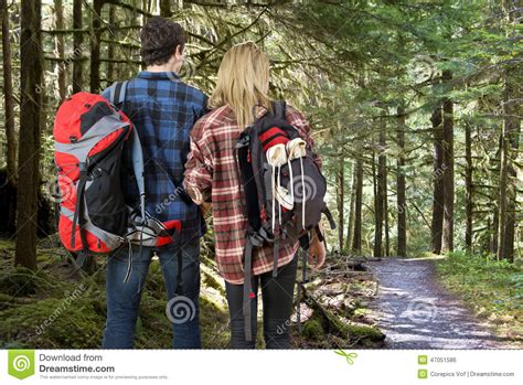 Backpacking Couple In A Forest Stock Photo Image Of Path Exploring