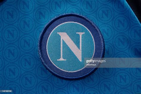 The Official Ssc Napoli Football Club Badge On A Home Shirt On May 3