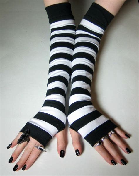 these black and white striped arm warmers are so soft these are warm and cozy enough to keep