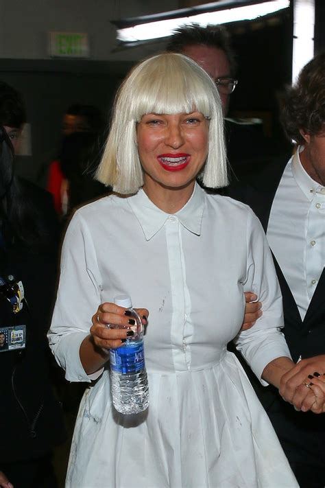 Why Does Sia Cover Her Face Who Magazine