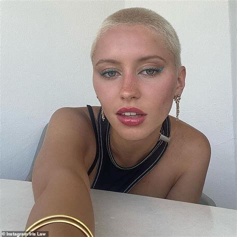 Iris Law Debuts New Blue Hair And Flashes Midriff In Keyhole Halterneck