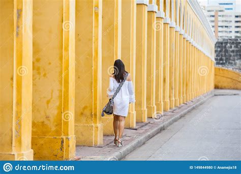 Beautiful Woman Walking Around The Walled City In Cartagena De Indias