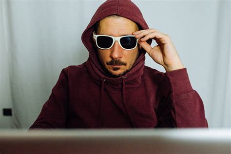 Portrait Of A Hacker In Hoodie Stock Photo Download Image Now 40 49