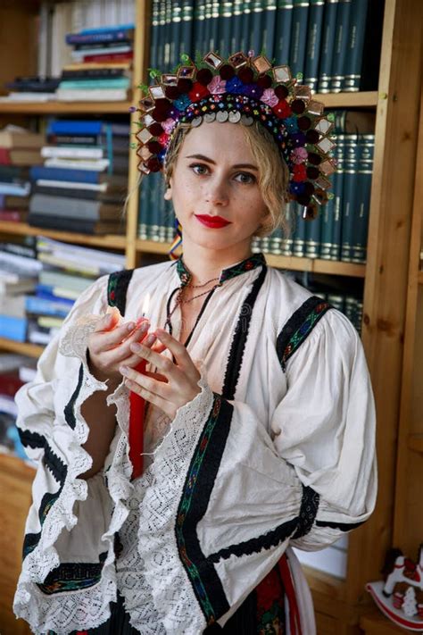 Beautiful Woman Dressed In Traditional Romanian Costume Stock Photo