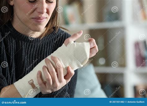 Woman Complaining Wearing Bandaged Arm At Home Stock Photo Image Of Injury Person