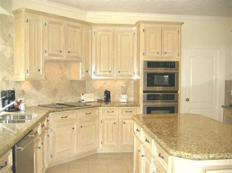If you have pickled cabinets you would like to stain a darker shade, it can be done; Pickled oak kitchen cabinets photos