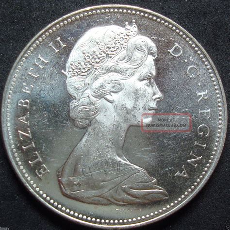 Silver bullion is simply silver that is in a form that indicated its weight and coins are usually minted with a monetary value printed on the face. 1965 Canada Silver Dollar Coin