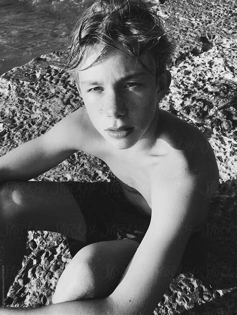 Download A Beautiful Young Boy On A Beach Royalty Free