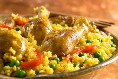 Cover and simmer over medium heat until chicken and rice are tender, about 20 minutes. Yellow Rice and Chicken - Vigo Foods
