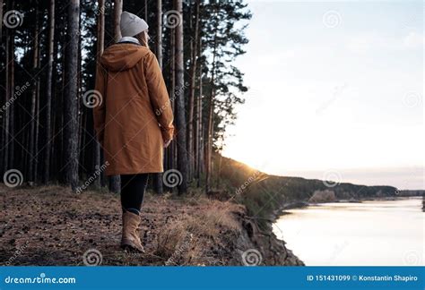 Female Traveller Walking On Bank Of River Stock Image Image Of Forest