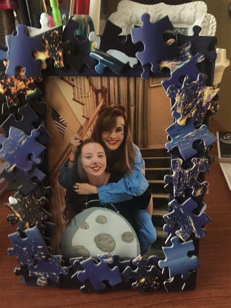 Learn about hanging pictures with wire and other ways to properly hang your picture frames. Space Themed Puzzle Piece picture frame!! | Puzzle piece ...