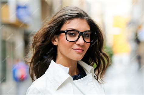 Free Photo Close Up Of Charming Woman With Glasses And Long Hair